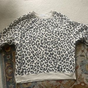a cheetah print sweater